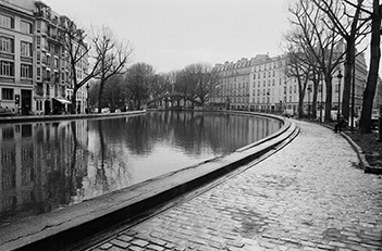 homepage image for Paris album, depicting a riverside walkway